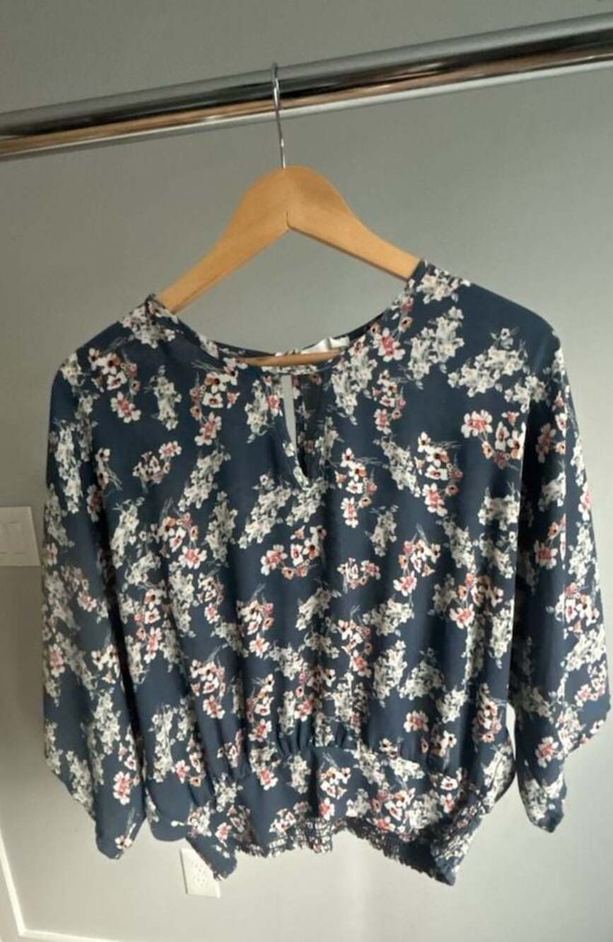 Sienna Sky Women's Blue Floral Smocked Hem Blouse with Flutter Sleeves